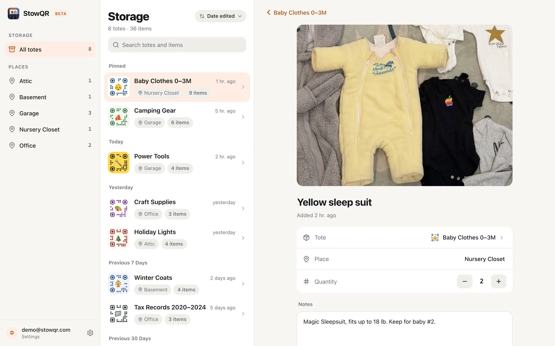 An item open in the StowQR web app, with a photo of a yellow sleep suit, its tote and place, a quantity of 2, and a note